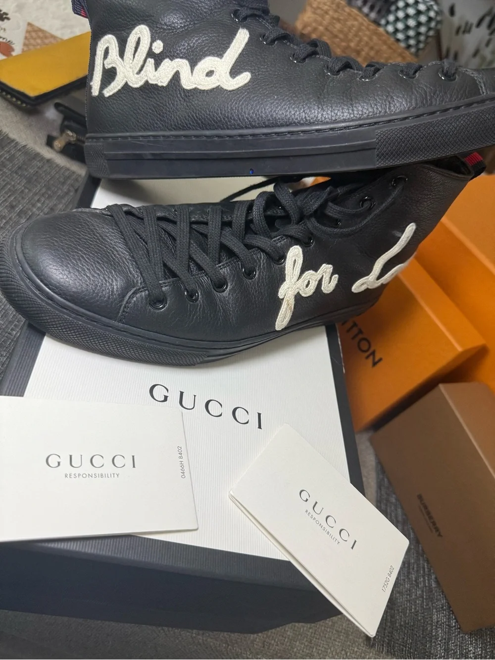 Gucci Black Leather High-Top Sneakers with White Script